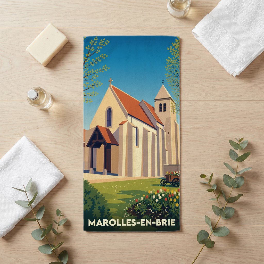Serviette de bain souvenir de Marolles-en-Brie avec une illustration stylisée de son église.