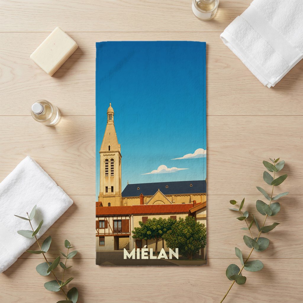 Serviette de bain souvenir de la ville de Miélan avec une illustration stylisée d'une église locale.