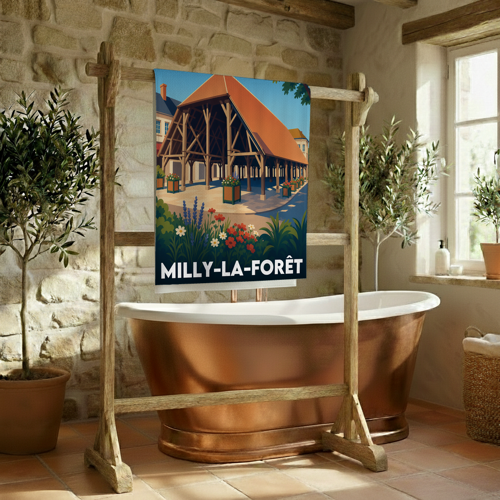 Serviette de bain souvenir de la ville de Milly-la-Forêt avec une illustration stylisée.
