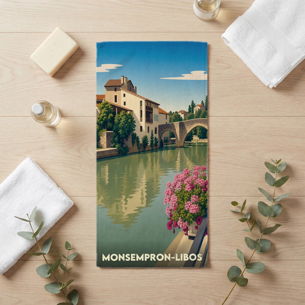Serviette de bain souvenir de la ville de Monsempron-Libos avec une illustration stylisée.