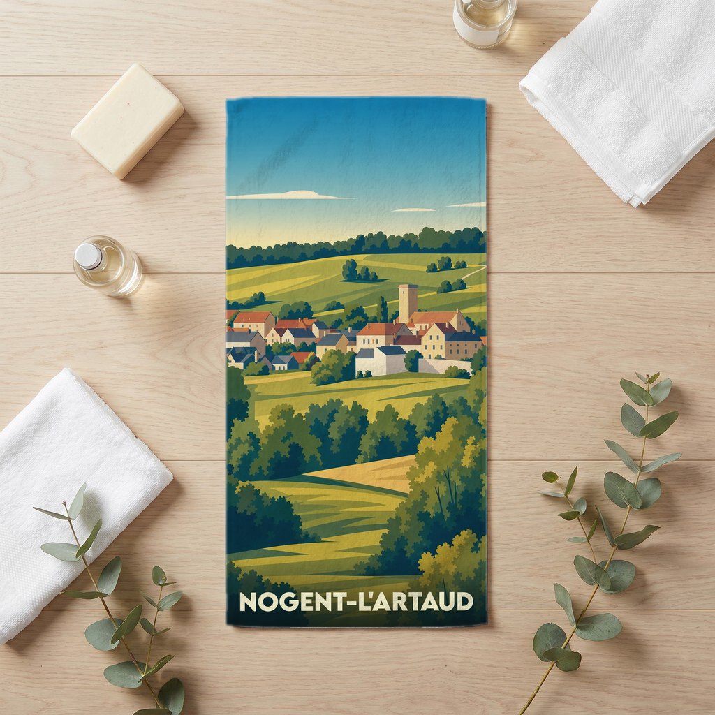 Serviette de bain souvenir de Nogent-l'Artaud illustrée d'un paysage de campagne stylisé.