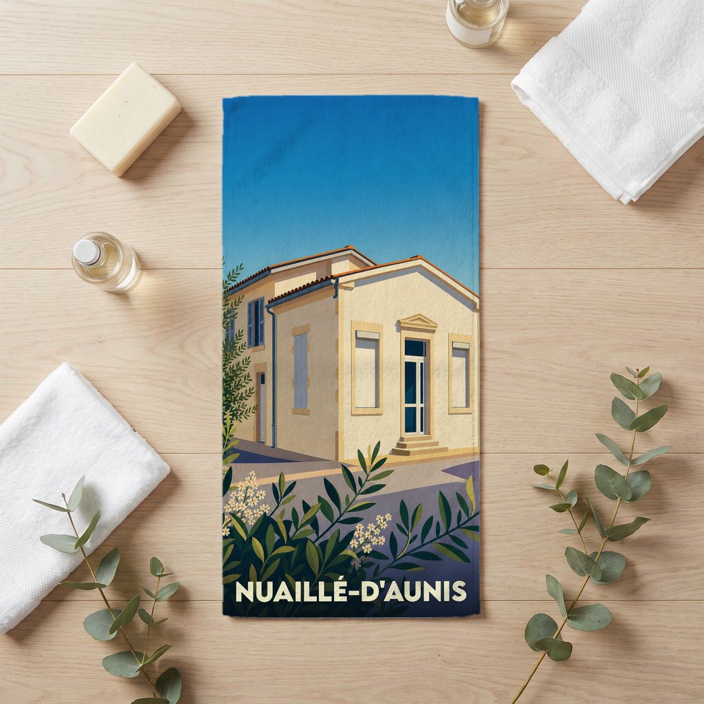 Serviette de bain souvenir de la ville de Nuaillé-d'Aunis avec une illustration stylisée d'un bâtiment.