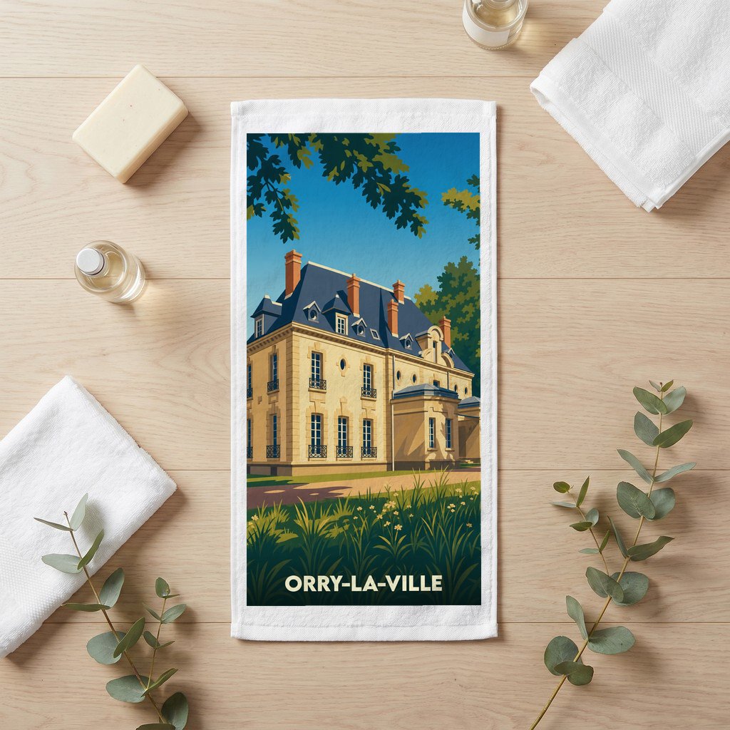 Serviette de bain souvenir de la ville d'Orry-la-Ville avec une illustration stylisée d'une demeure bourgeoise.