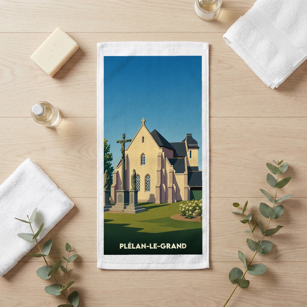 Serviette de bain souvenir de la ville de Plélan-le-Grand avec une illustration stylisée de son église.