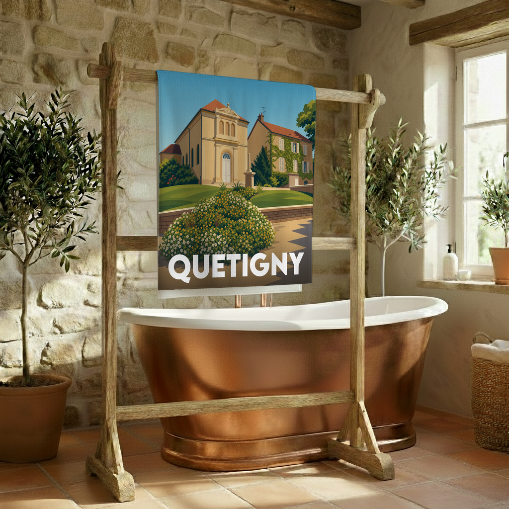 Serviette de bain souvenir de la ville de Quetigny avec une illustration stylisée.