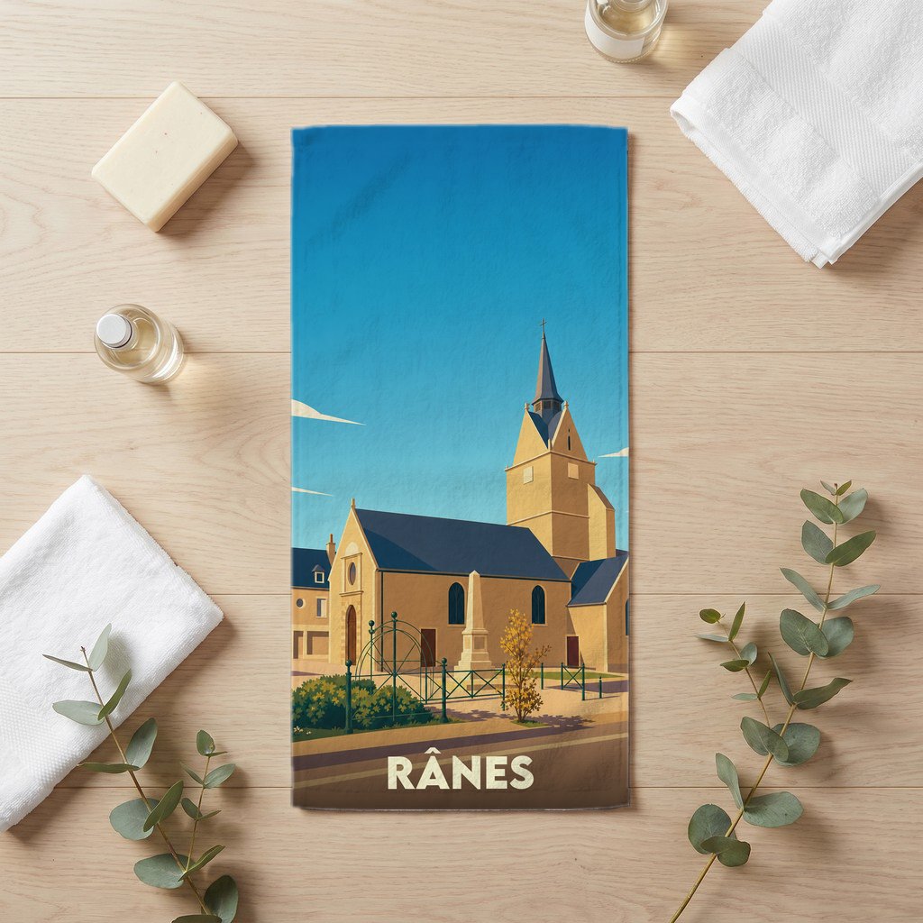 Serviette de bain souvenir de la ville de Rânes avec une illustration stylisée de son église.
