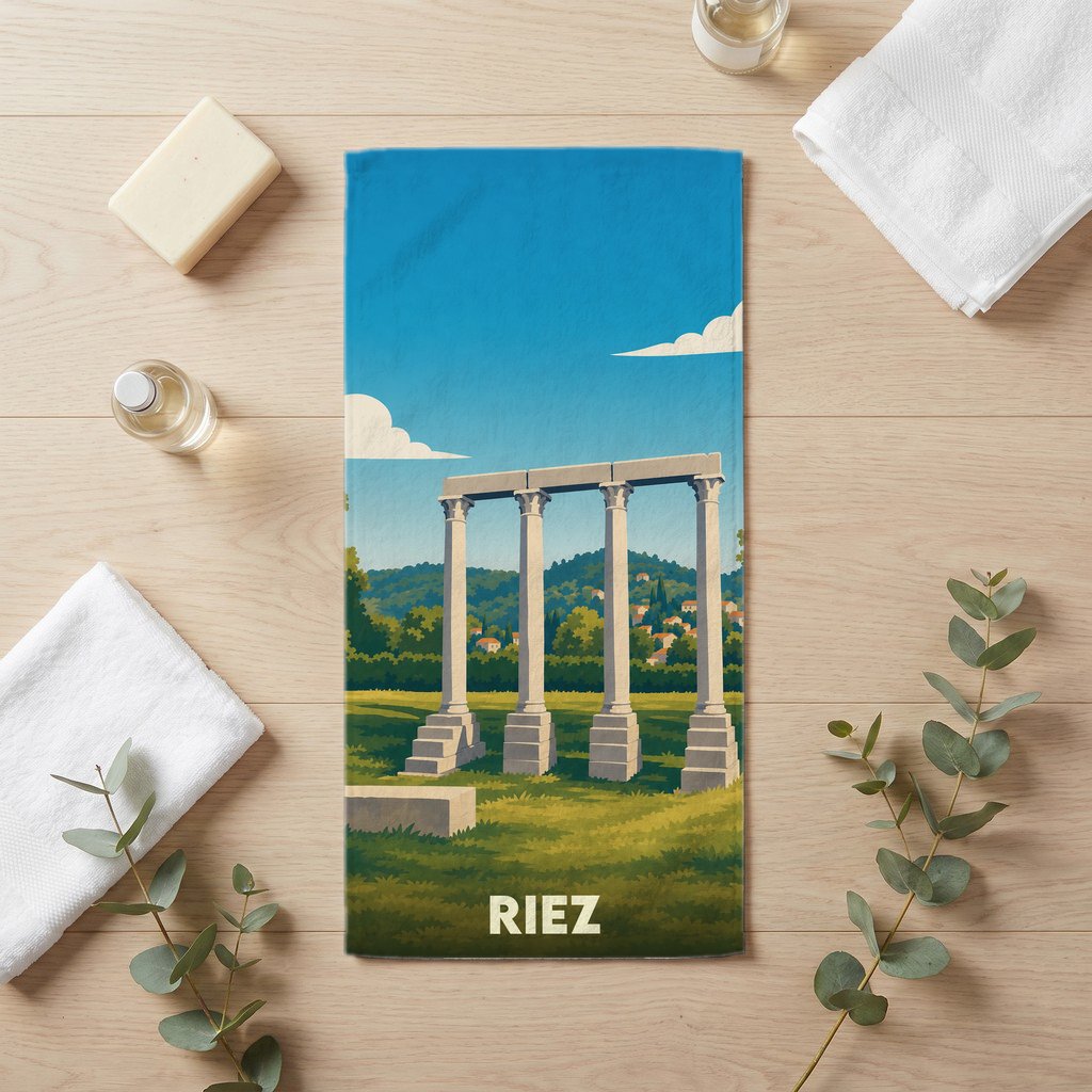 Serviette de bain souvenir de la ville de Riez avec une illustration stylisée des colonnes romaines.