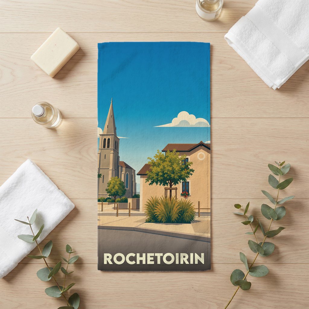 Serviette de bain souvenir de la ville de Rochetoirin avec une illustration stylisée.