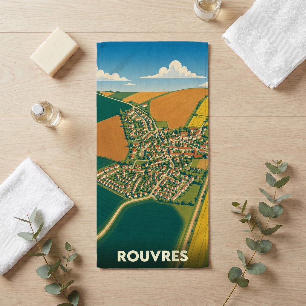 Serviette de bain souvenir de la ville de Rouvres avec une illustration stylisée d'une vue aérienne.