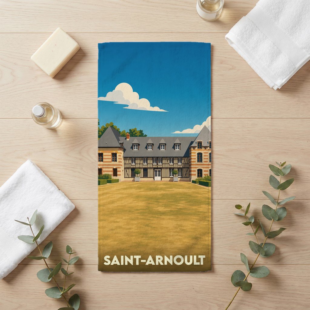 Serviette de bain souvenir de la ville de Saint-Arnoult avec une illustration stylisée d'un manoir normand.