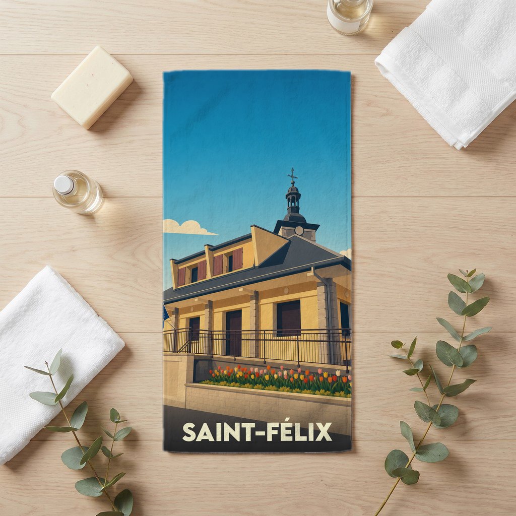 Serviette de bain souvenir de la ville de Saint-Félix avec une illustration stylisée.