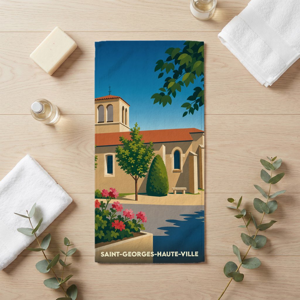 Serviette de bain souvenir de Saint-Georges-Haute-Ville avec une illustration stylisée de son église et de ses jardins.