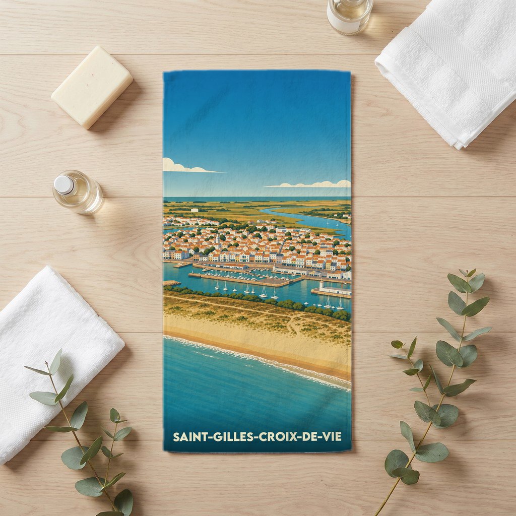 Serviette de bain souvenir de Saint-Gilles-Croix-de-Vie avec une illustration panoramique stylisée de la ville et de sa côte.