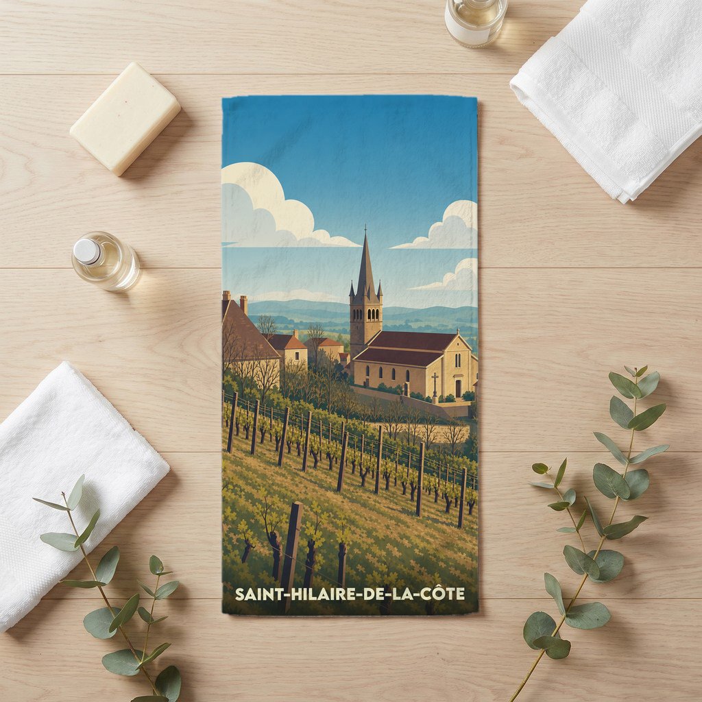 Serviette de bain souvenir de Saint-Hilaire-de-la-Côte avec une illustration de l'église et du vignoble.