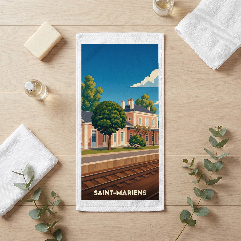 Serviette de bain souvenir de la ville de Saint-Mariens avec une illustration stylisée d'une gare ferroviaire.
