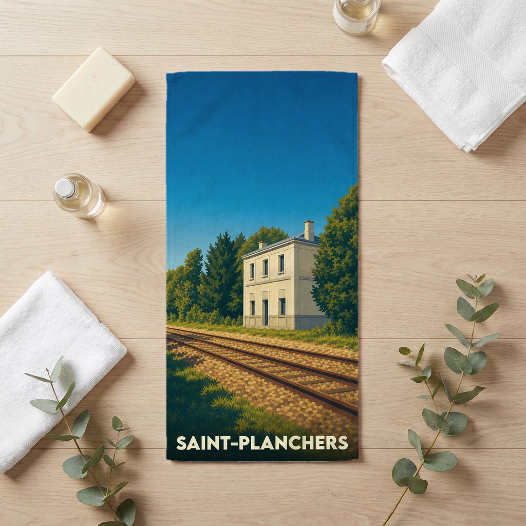 Serviette de bain souvenir de la ville de Saint-Planchers avec une illustration stylisée d'une gare ferroviaire.