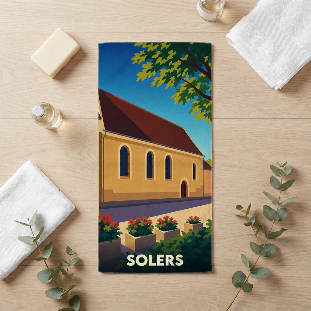 Serviette de bain souvenir de la ville de Solers avec une illustration stylisée.