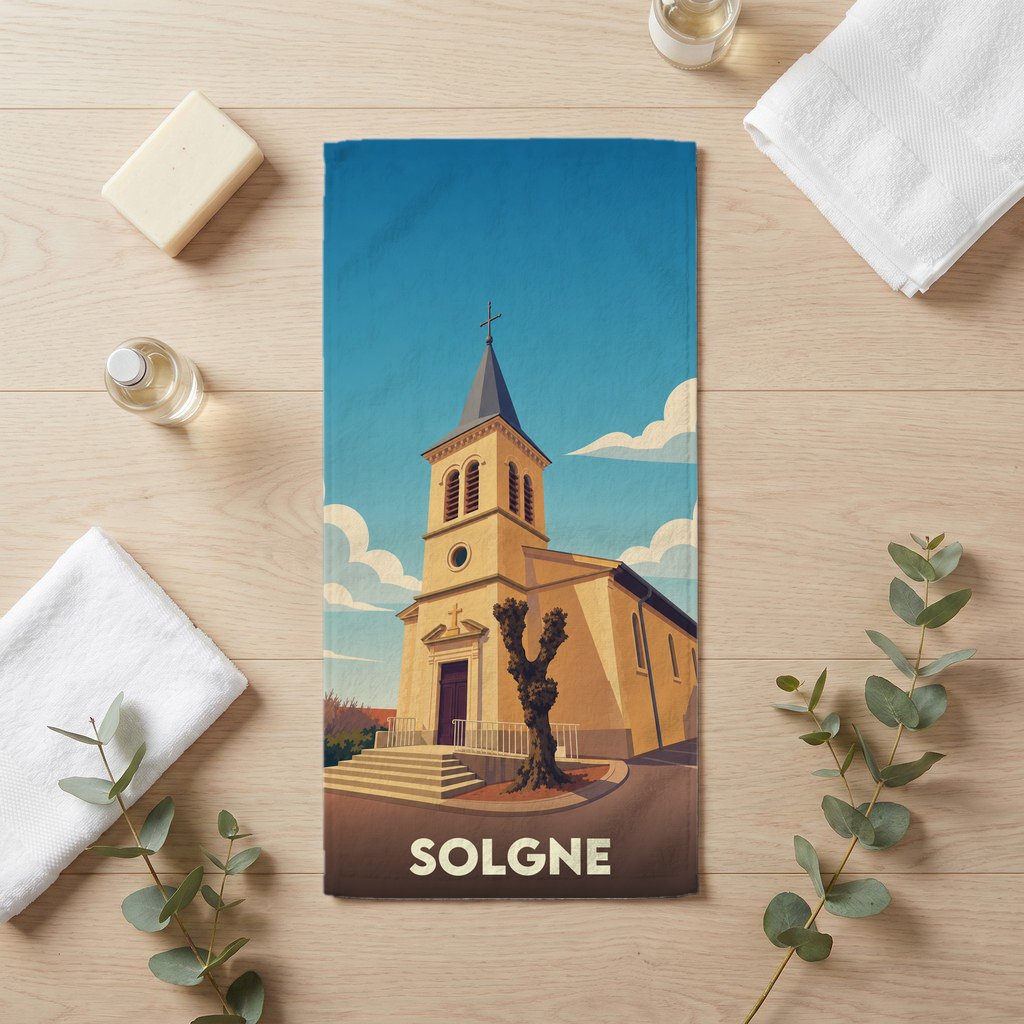 Serviette de bain souvenir de la ville de Solgne avec une illustration stylisée de son église.