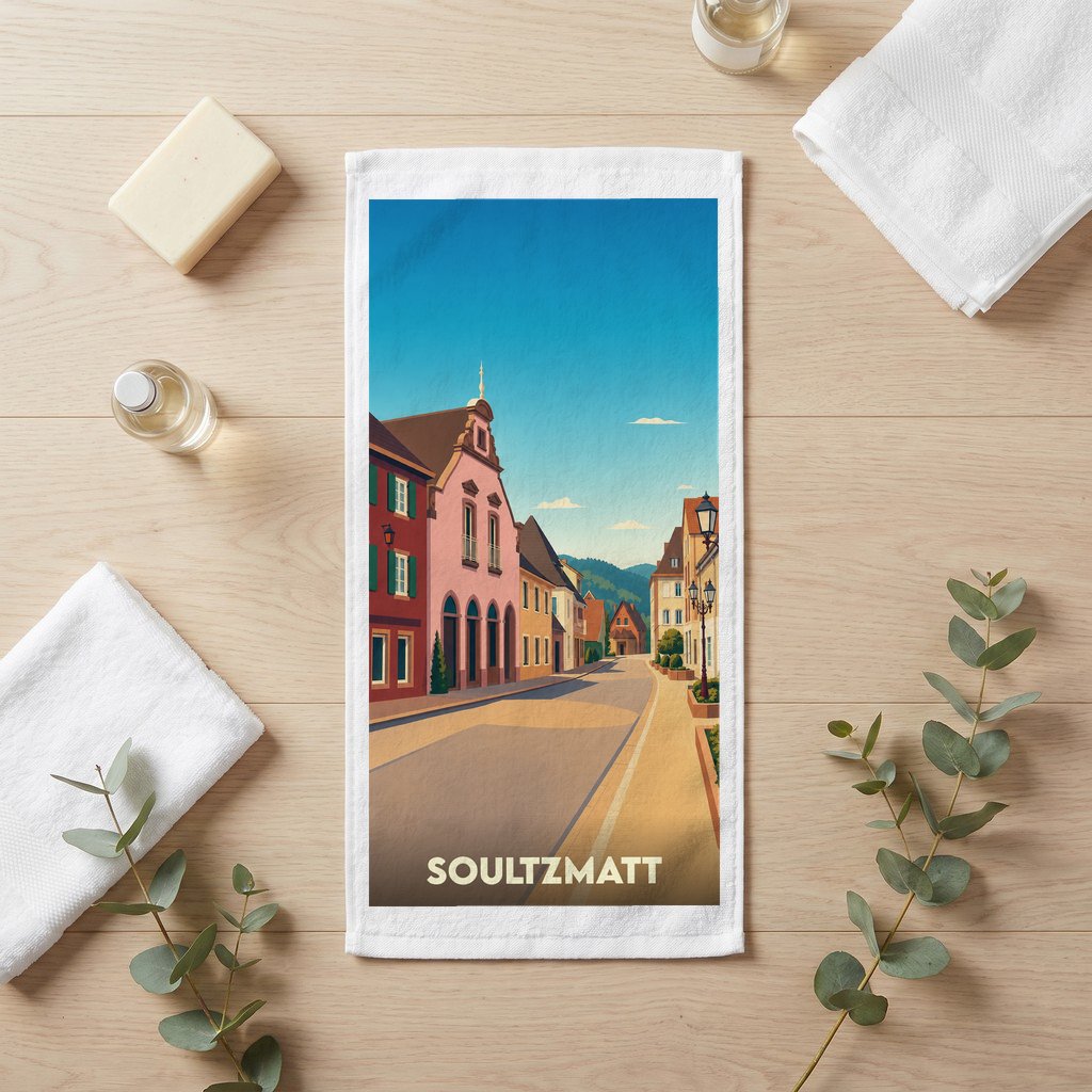 Serviette de bain souvenir de la ville de Soultzmatt avec une illustration stylisée.