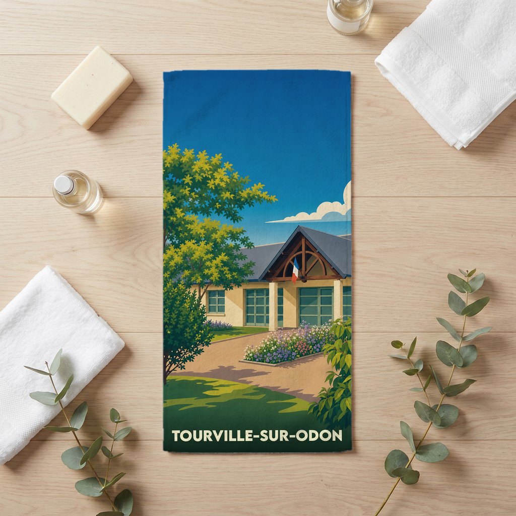 Serviette de bain souvenir de la ville de Tourville-sur-Odon avec une illustration stylisée.