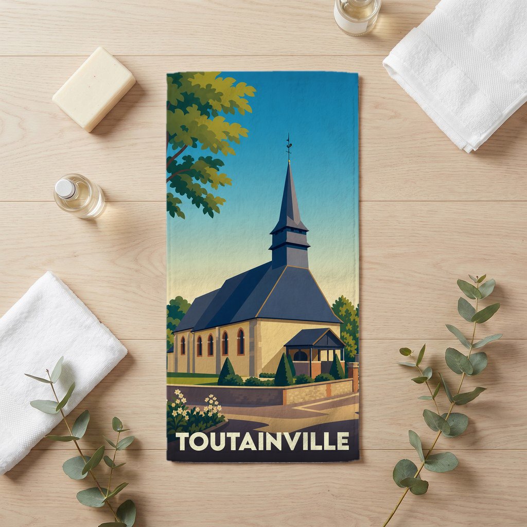 Serviette de bain souvenir de la ville de Toutainville illustrant son église dans un style vintage.