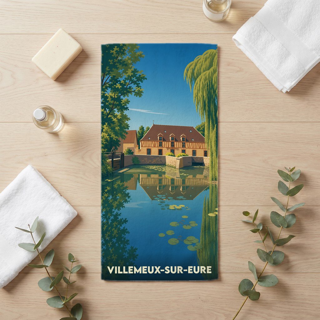 Serviette de bain souvenir de la ville de Villemeux-sur-Eure avec une illustration stylisée.