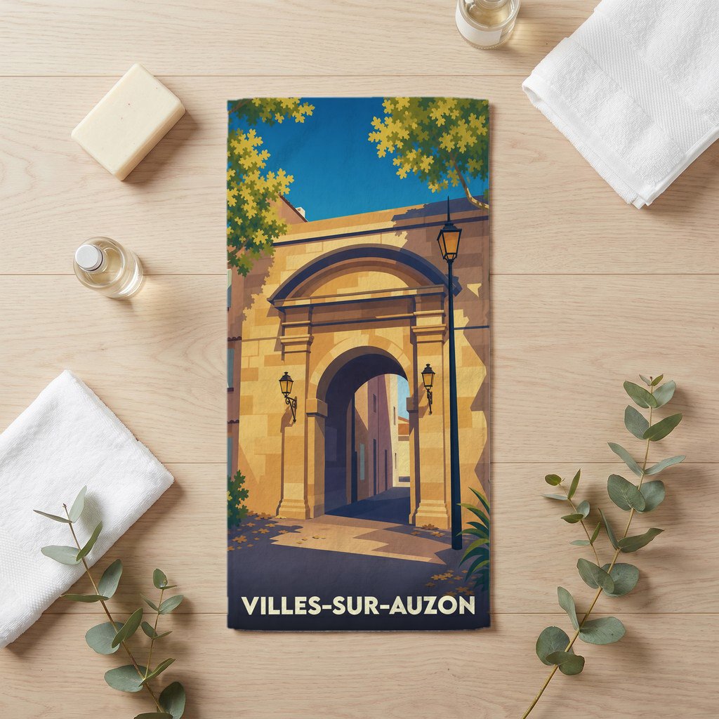 Serviette de bain souvenir de la ville de Villes-sur-Auzon avec une illustration stylisée.