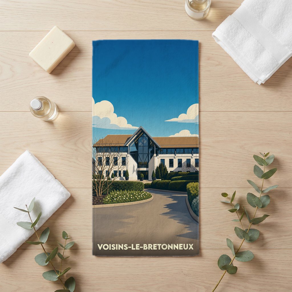 Serviette de bain souvenir de la ville de Voisins-le-Bretonneux avec une illustration stylisée.