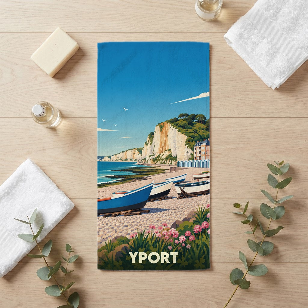 Serviette de bain souvenir de la ville d'Yport avec une illustration stylisée de sa plage et de ses falaises.