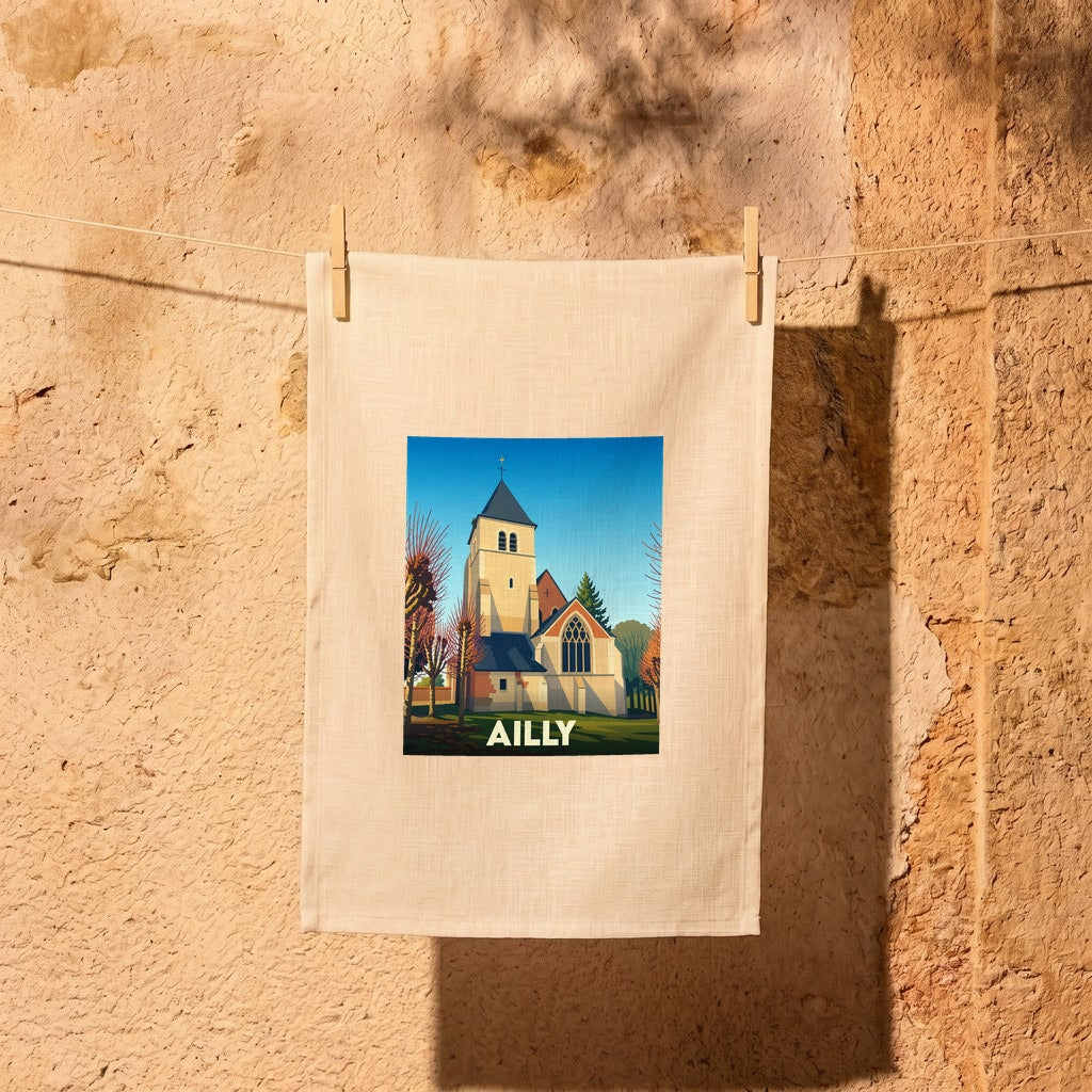 Torchon souvenir de la ville d'Ailly avec une illustration stylisée d'une église.