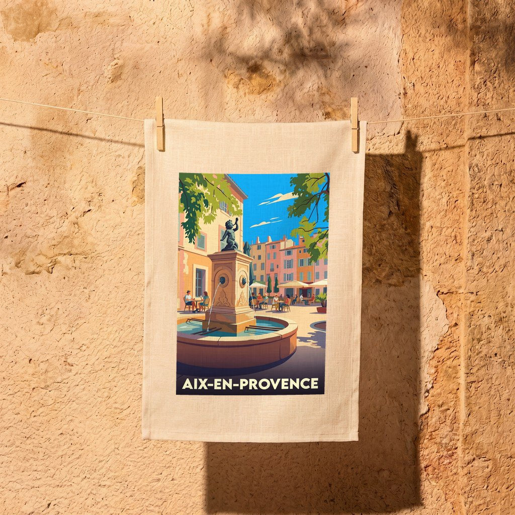 Torchon souvenir de la ville d'Aix-en-Provence avec une illustration stylisée d'une place ensoleillée.