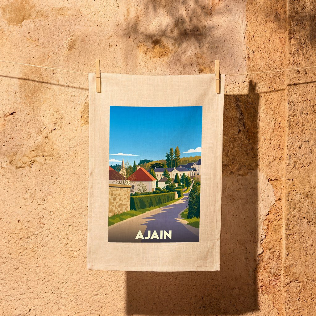 Torchon souvenir de la ville d'Ajain avec une illustration stylisée d'un paysage urbain verdoyant.