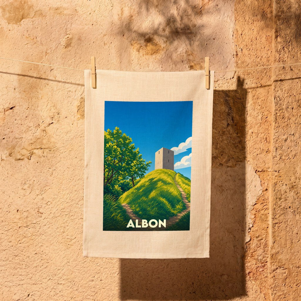 Torchon souvenir de la ville d'Albon avec une illustration stylisée d'une tour sur une colline.