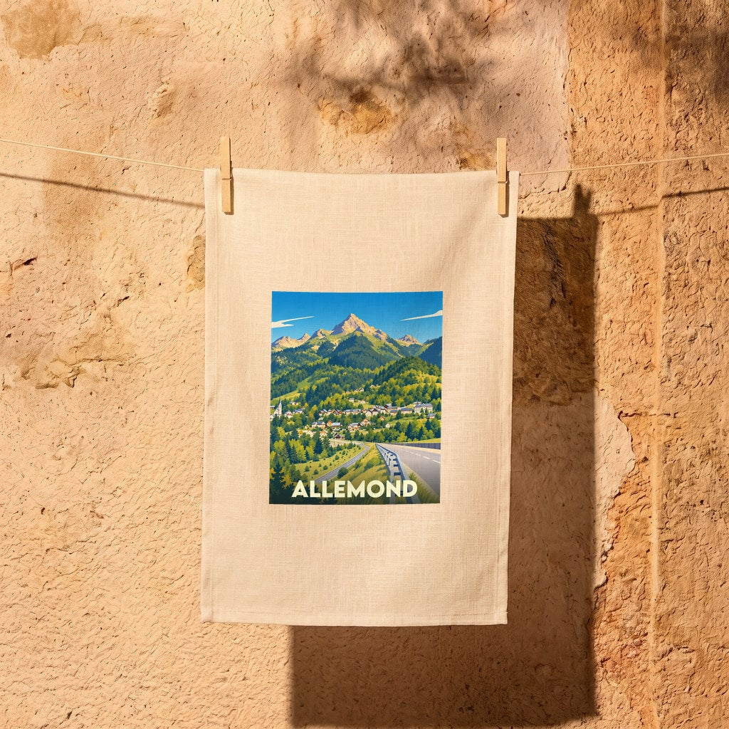 Torchon souvenir de la ville d'Allemond avec une illustration stylisée de montagne.