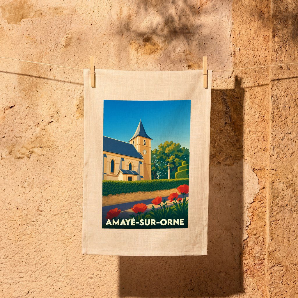 Torchon souvenir de la ville d'Amayé-sur-Orne avec une illustration stylisée de son église et de fleurs champêtres.