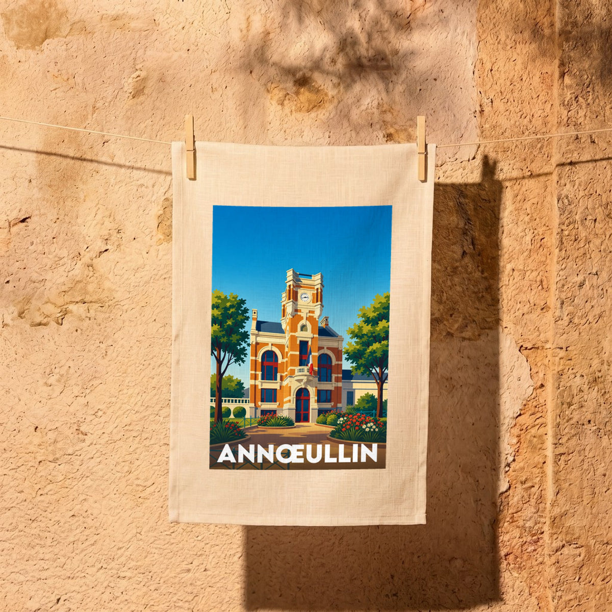 Torchon souvenir de la ville d'Annœullin illustré par son hôtel de ville de style flamand.