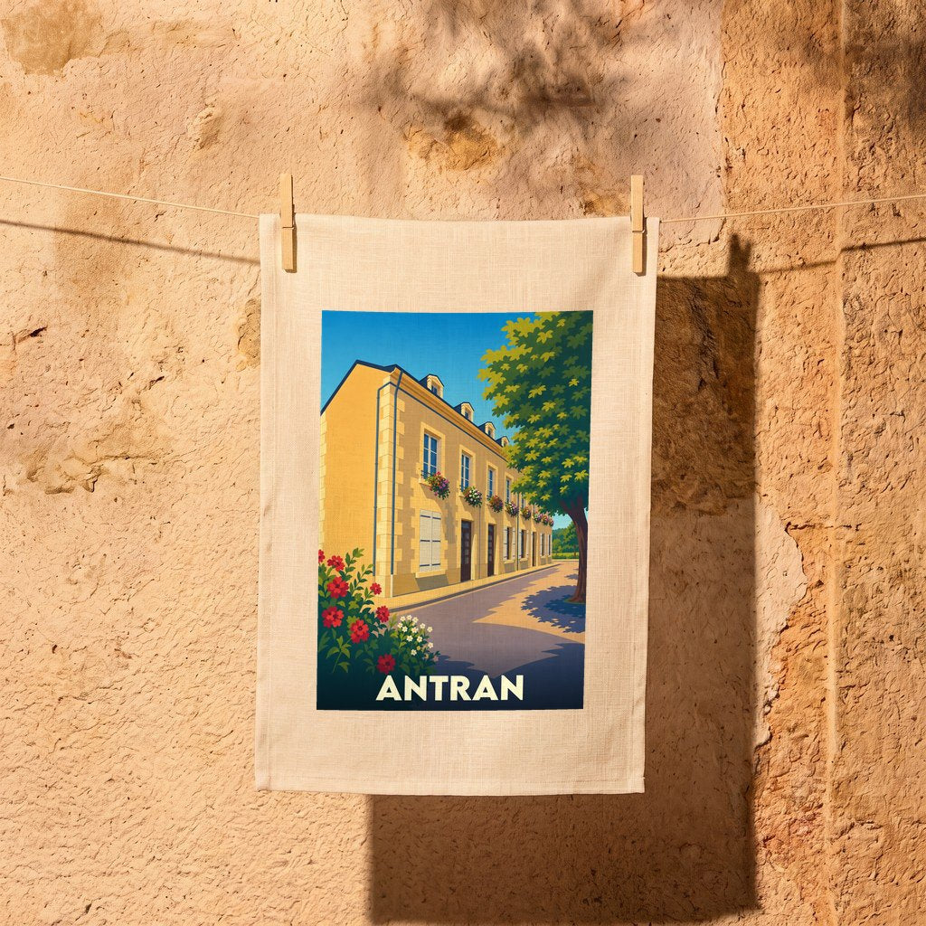 Torchon souvenir de la ville de Antran avec une illustration stylisée d'un bâtiment ensoleillé.