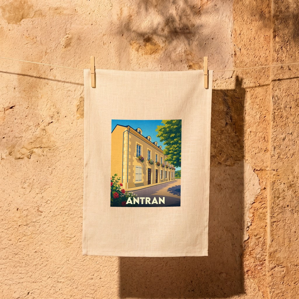 Torchon souvenir de la ville de Antran avec une illustration stylisée d'un bâtiment ensoleillé.