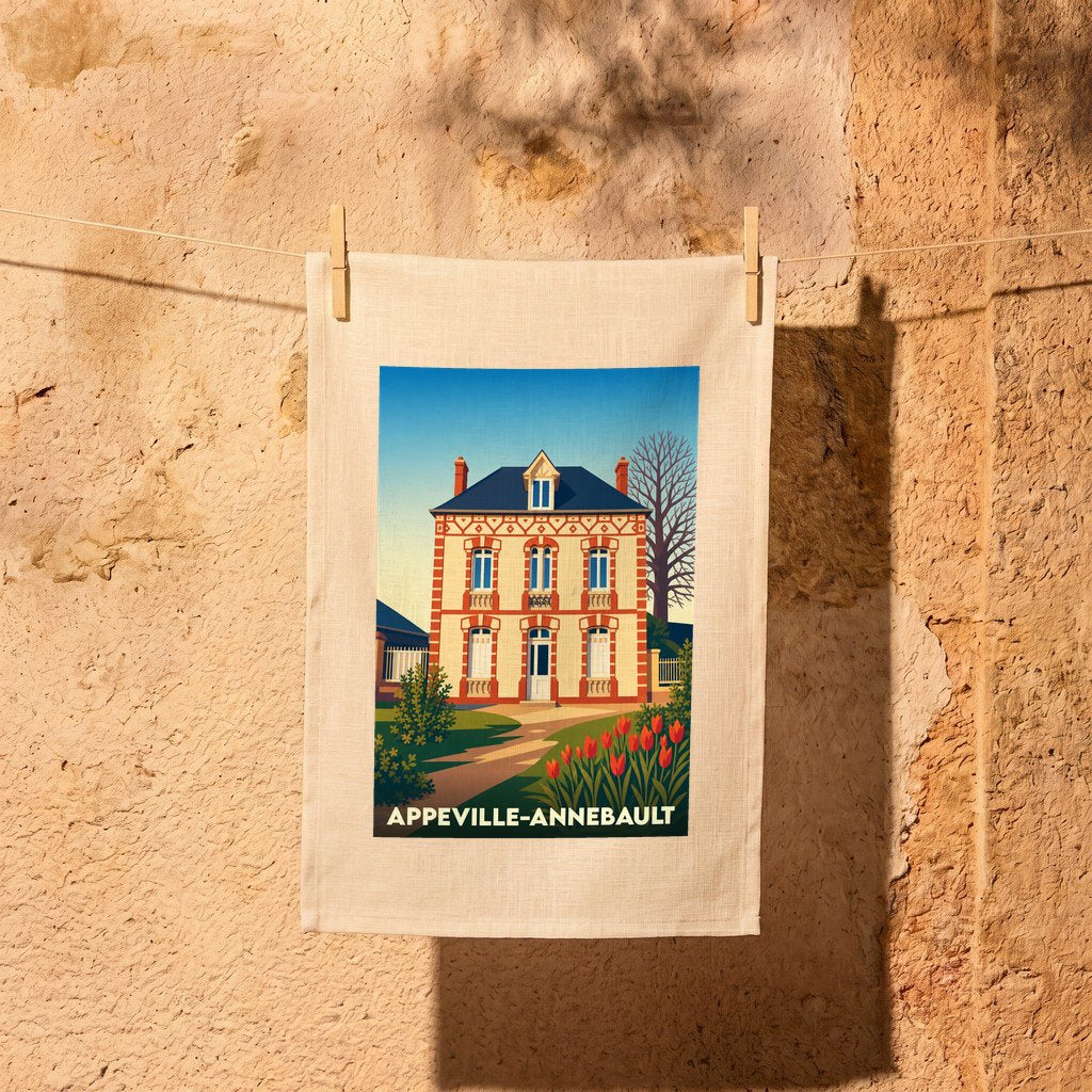 Torchon souvenir de la ville d'Appeville-Annebault avec une illustration stylisée d'une maison de maître normande.
