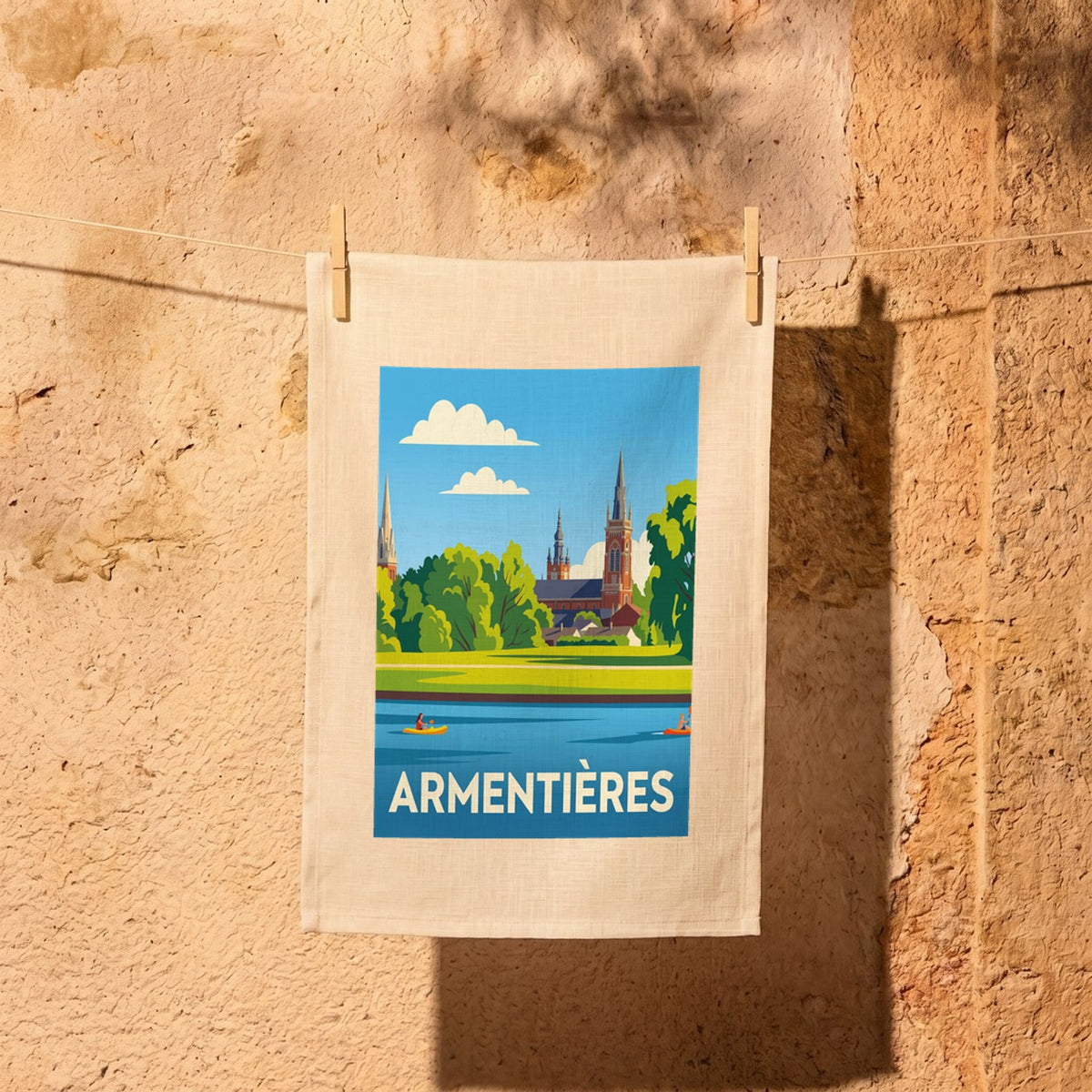 Torchon souvenir de la ville d'Armentières avec une illustration stylisée.