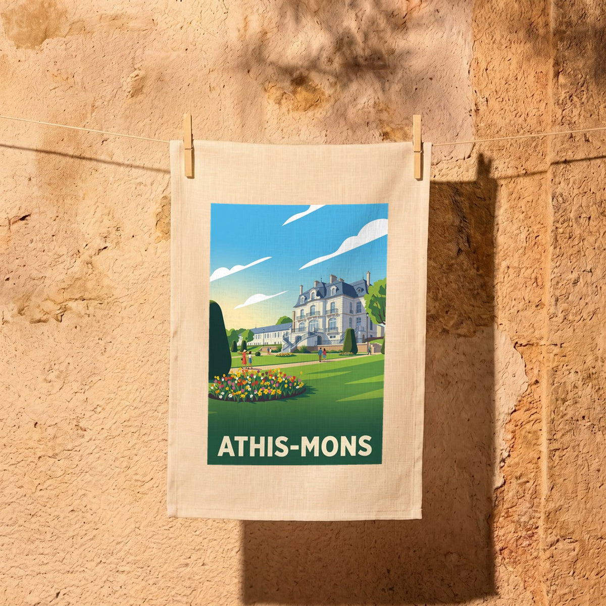 Torchon souvenir de la ville d'Athis-Mons avec une illustration stylisée.