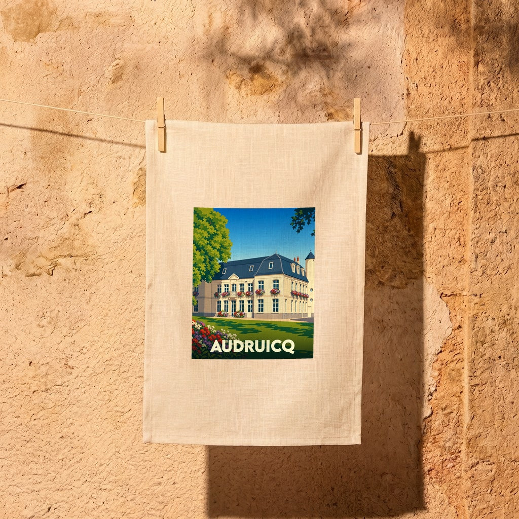 Torchon souvenir de la ville d'Audruicq avec une illustration stylisée d'un bâtiment historique.