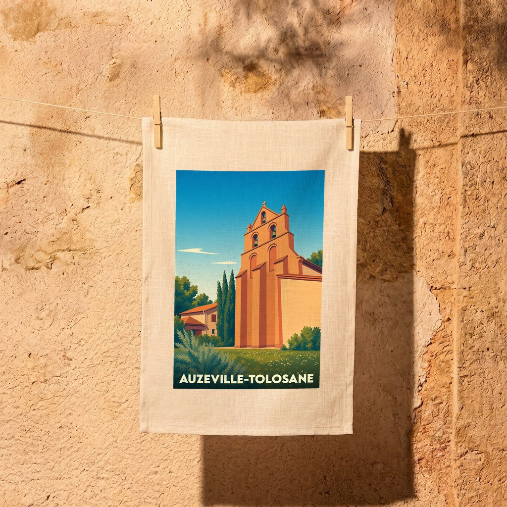 Torchon souvenir de la ville d'Auzeville-Tolosane avec une illustration stylisée de son église.