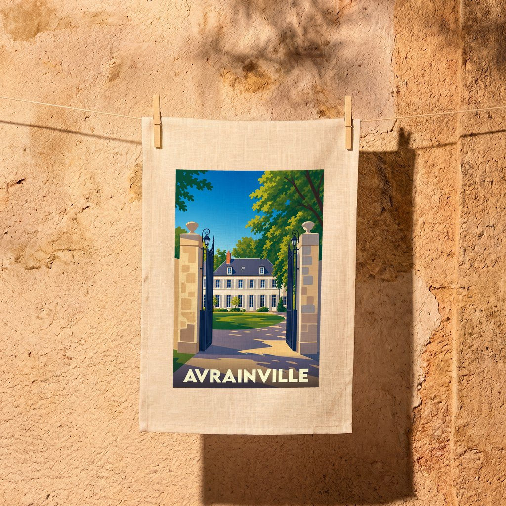 Torchon souvenir de la ville d'Avrainville avec une illustration stylisée d'un château derrière un portail.