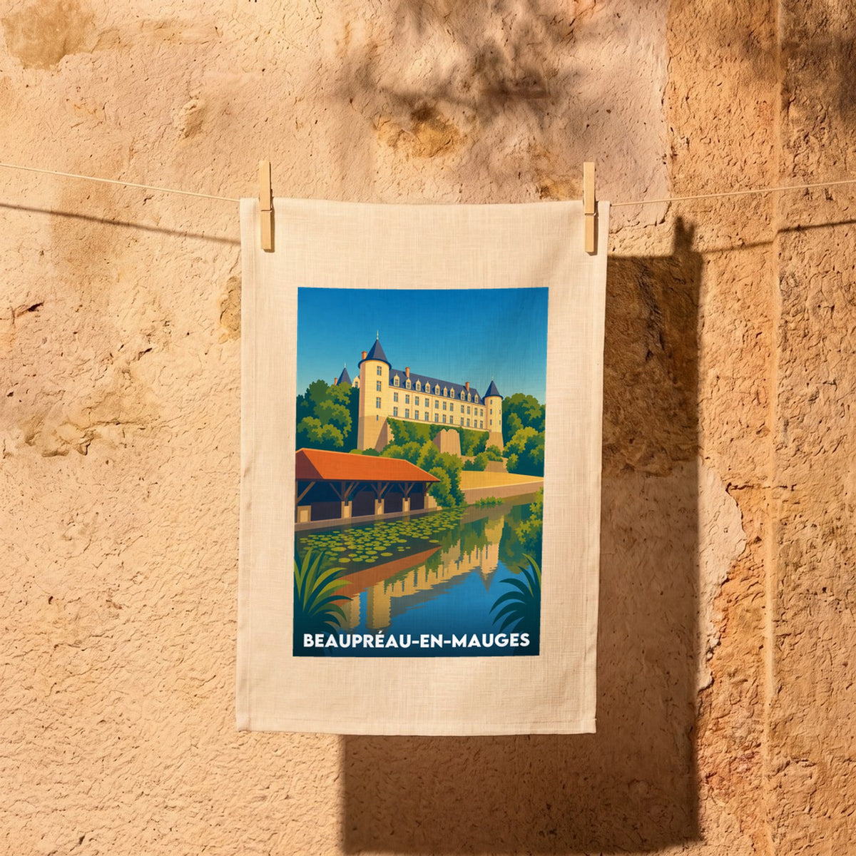 Torchon souvenir de la ville de Beaupréau-en-Mauges avec une illustration stylisée.