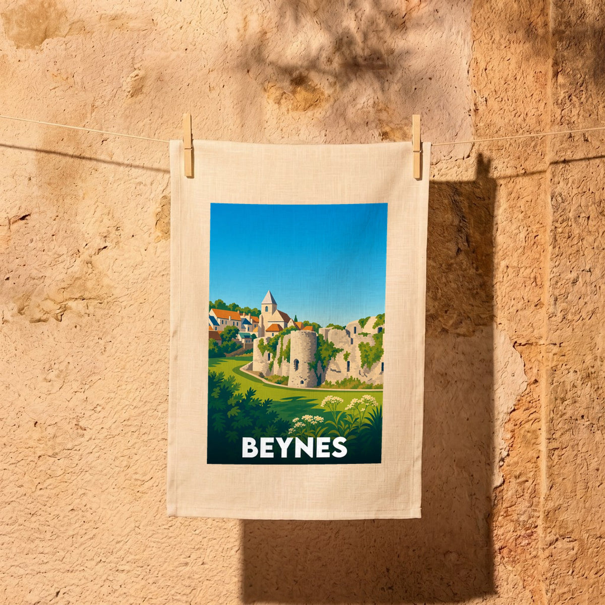 Torchon souvenir de la ville de Beynes avec une illustration stylisée.