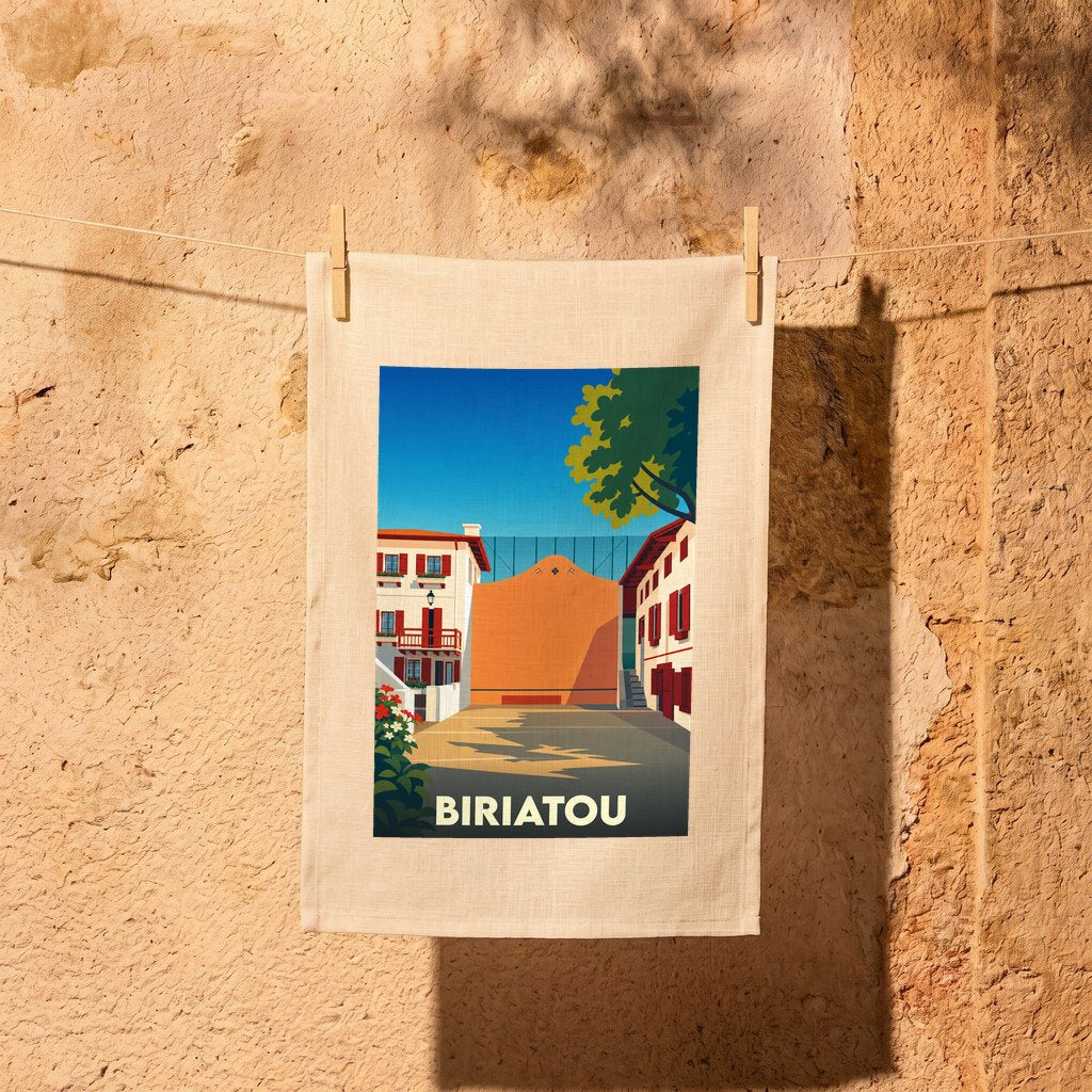 Torchon souvenir de la ville de Biriatou avec une illustration stylisée.