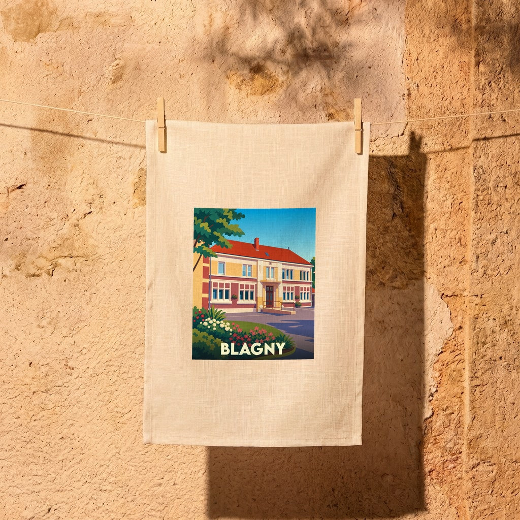 Torchon souvenir de la ville de Blagny avec une illustration stylisée d'un bâtiment emblématique.