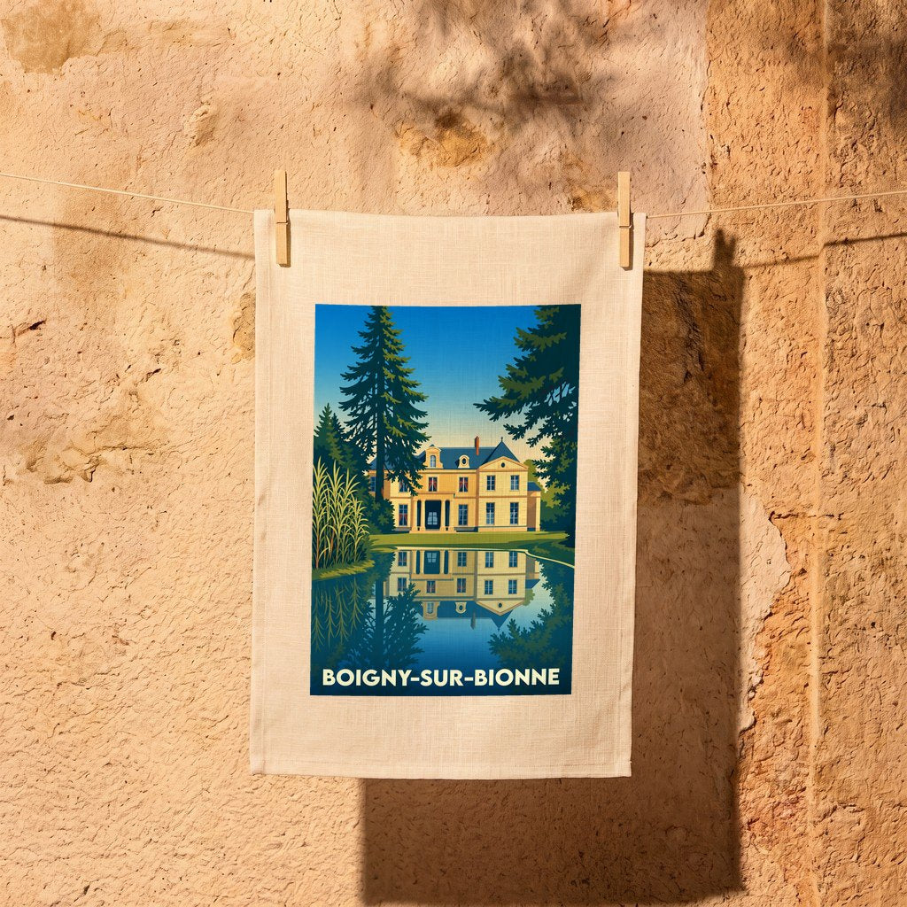 Torchon souvenir de la ville de Boigny-sur-Bionne illustré par une vue stylisée d'un manoir se reflétant dans l'eau.