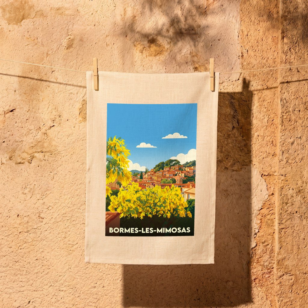 Torchon souvenir de la ville de Bormes-les-Mimosas avec une illustration stylisée.